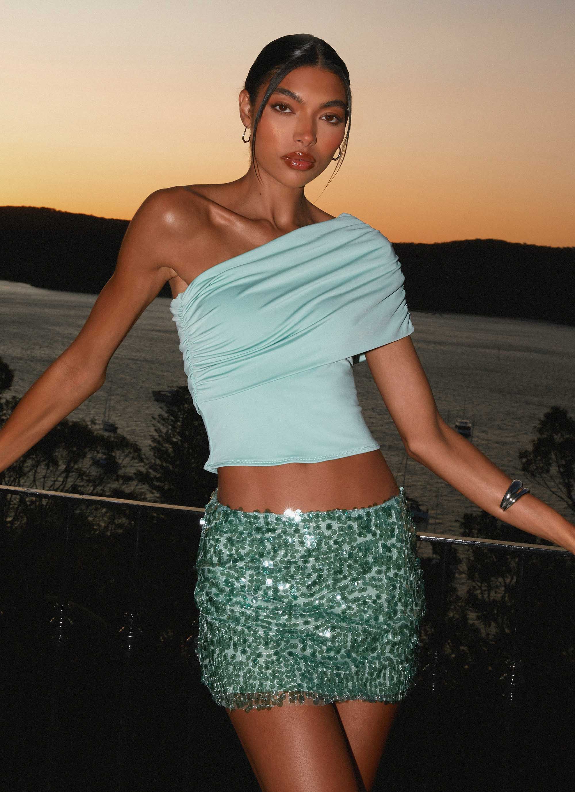 Green glitter mini skirt outlet