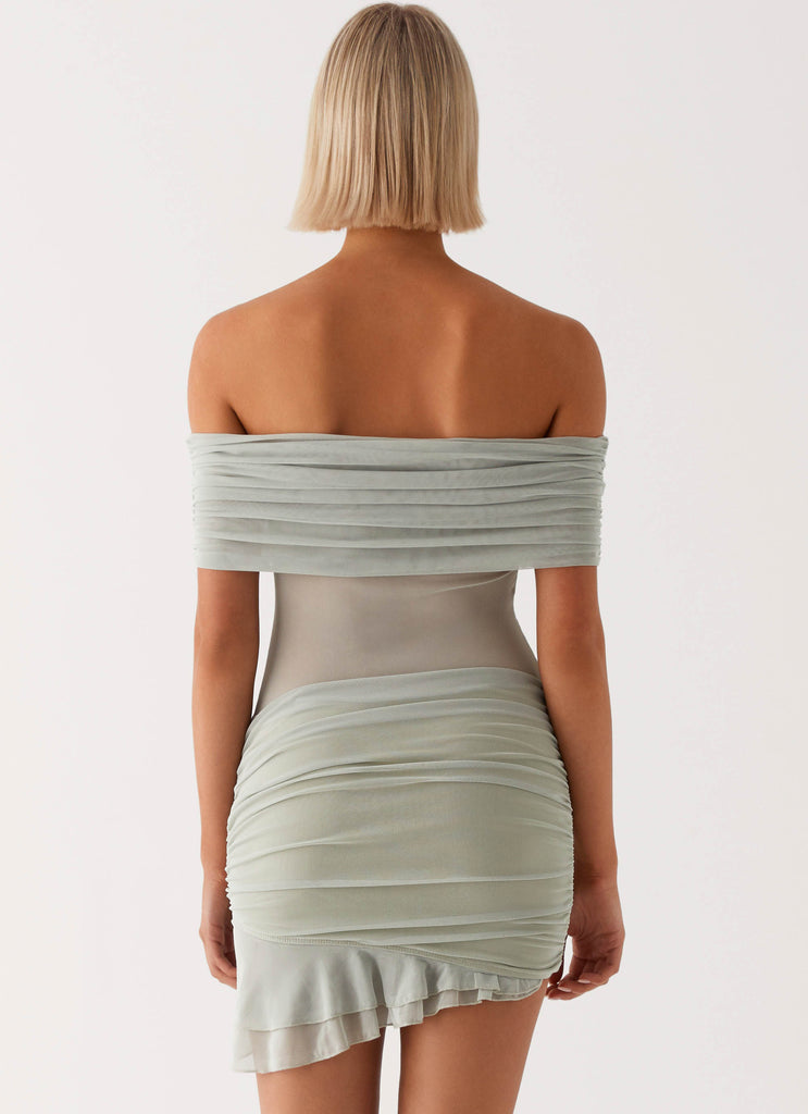 Womens Nelly Off Shoulder Mini Dress in the colour Pistachio in front of a light grey background