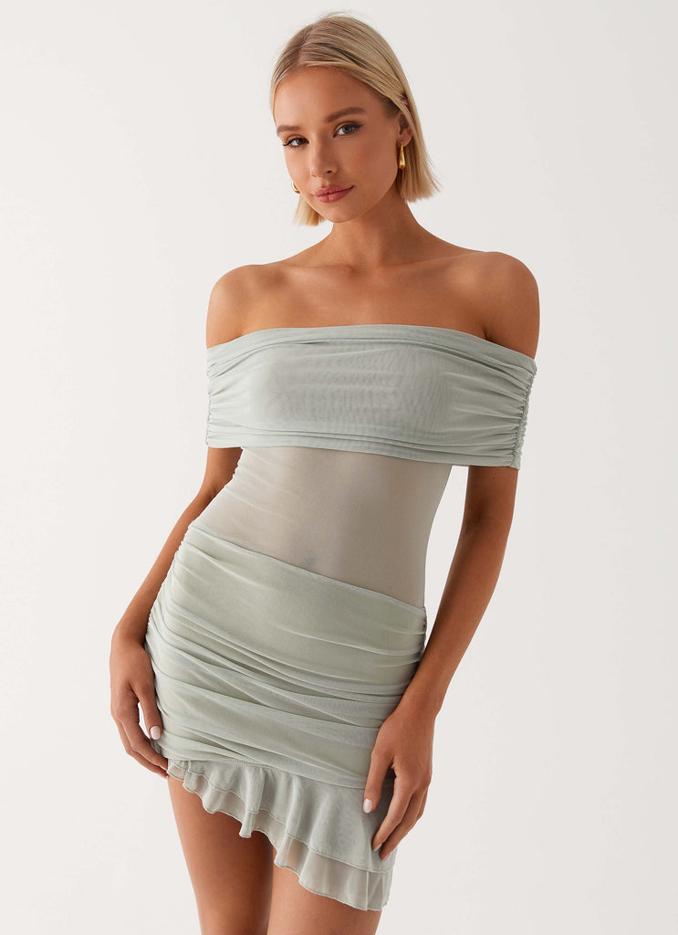 Womens Nelly Off Shoulder Mini Dress in the colour Pistachio in front of a light grey background
