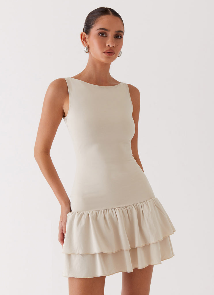 Womens Rhiannon Frill Mini Dress in the colour Ivory in front of a light grey background