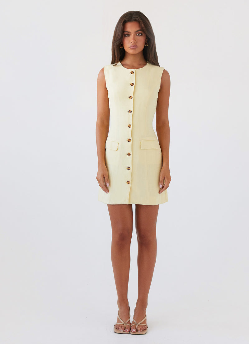 Womens Castello Fiore Linen Mini Dress in the colour Lemon in front of a light grey background