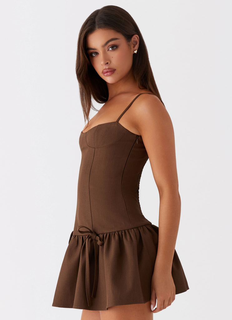 Womens Running Late Mini Dress in the colour Chocolate in front of a light grey background
