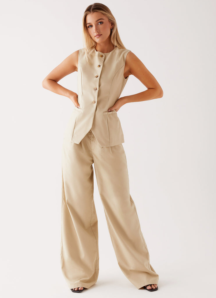 Womens Siena Style Tailored Pants in the colour Beige in front of a light grey background