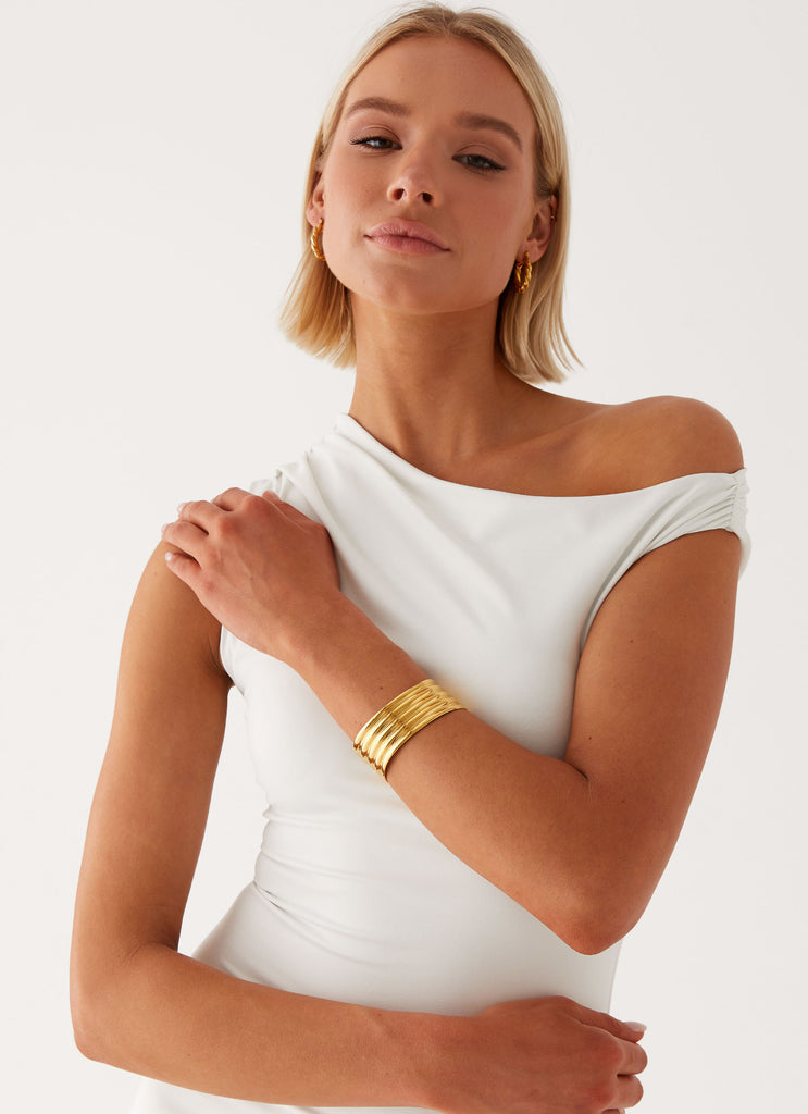 Womens Belong Together Bracelet in the colour Gold in front of a light grey background