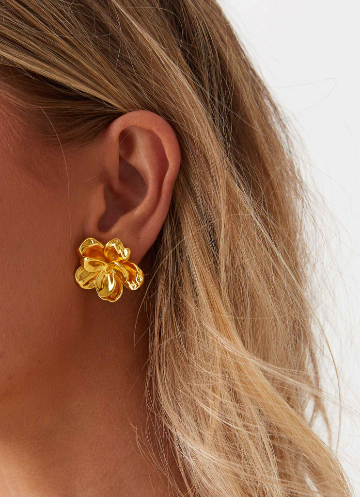 Womens Bold Rosette Earrings in the colour Gold in front of a light grey background