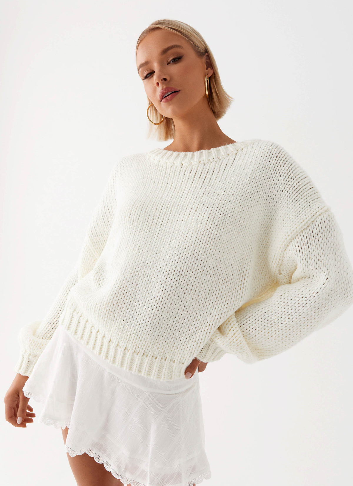 Womens Costella Knit Sweater in the colour Ivory in front of a light grey background