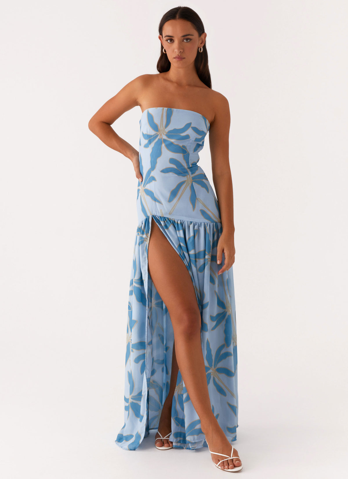 eden strapless maxi dress length maxi skirt creates an elongated streamlined profile for occasion wear Minimal seam detailing keeps the focus on clean lines and balanced proportions Concealed back fastening maintains a secure fit and uninterrupted finish The fit is close through the bodice with a softly flowing shape through the skirt for comfortable movement Eden Strapless Maxi Dress -