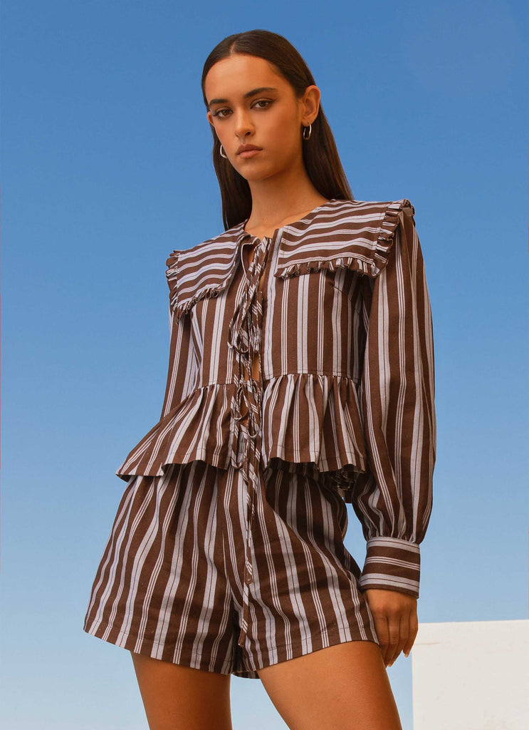Womens Emerson Tie Front Long Sleeve Top in the colour Purple Brown Stripe in front of a light grey background