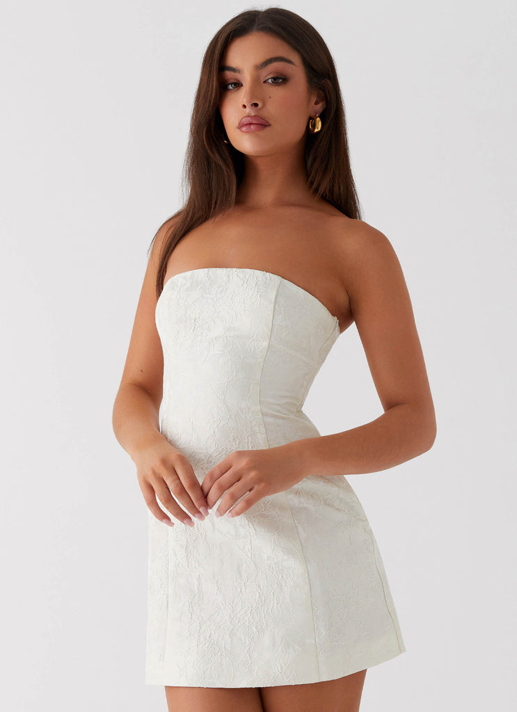 Womens Eternity Strapless Mini Dress in the colour Ivory in front of a light grey background