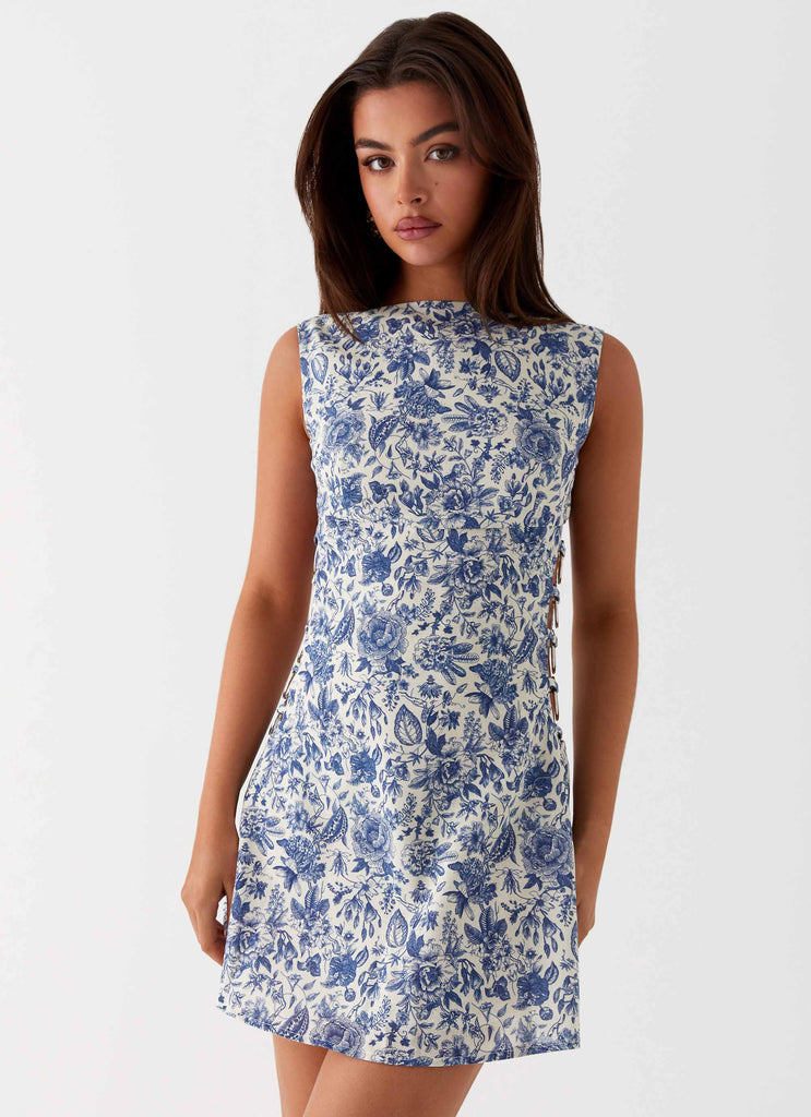 Womens Indigo Bloom Linen Mini Dress in the colour Blue Paisley in front of a light grey background