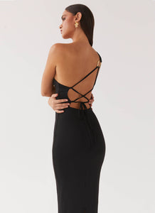 Womens Iris Backless Maxi Dress in the colour Black in front of a light grey background