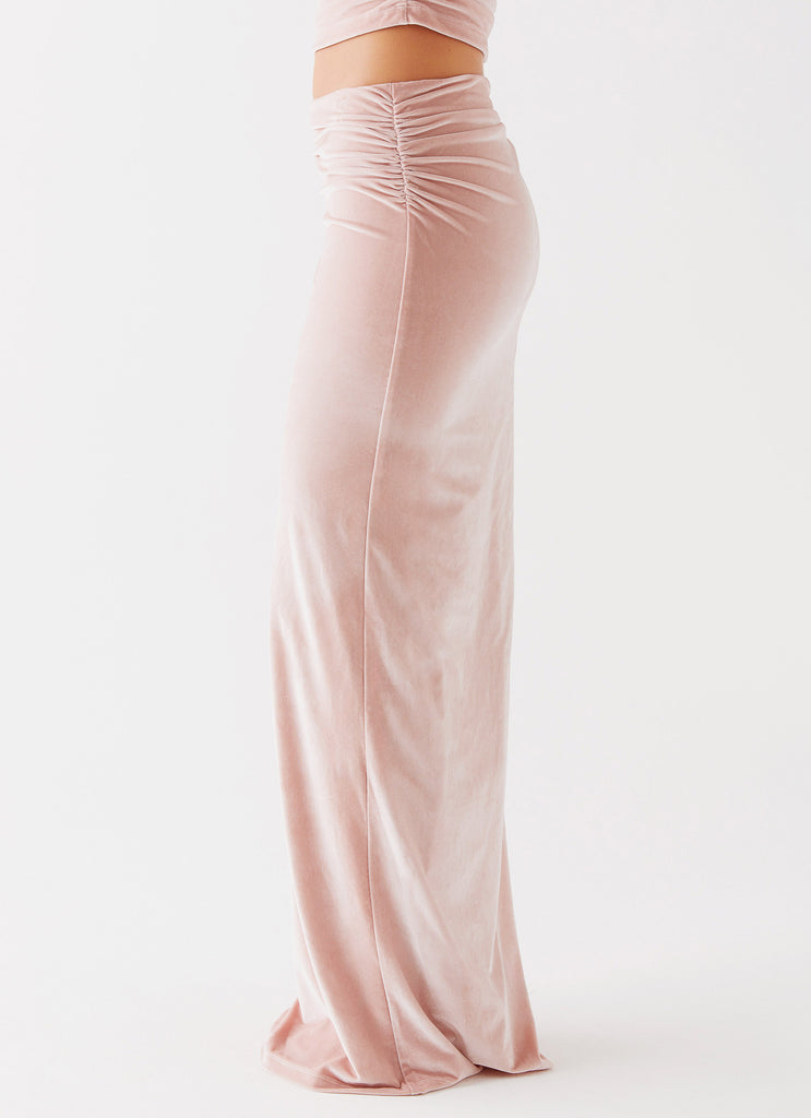 Womens Josie Velvet Maxi Skirt in the colour Pink in front of a light grey background