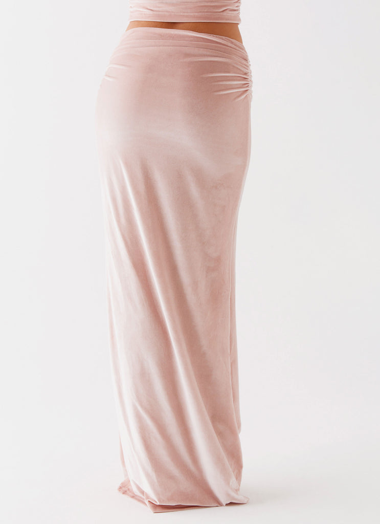 Womens Josie Velvet Maxi Skirt in the colour Pink in front of a light grey background