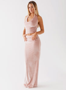 Womens Josie Velvet Maxi Skirt in the colour Pink in front of a light grey background