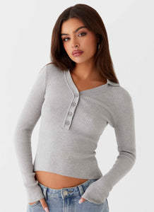 Womens Kelisa Long Sleeve Knit Top in the colour Grey in front of a light grey background