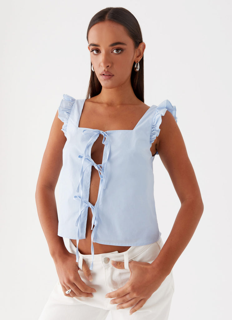 Womens Kiani Tie Front Top in the colour Blue in front of a light grey background