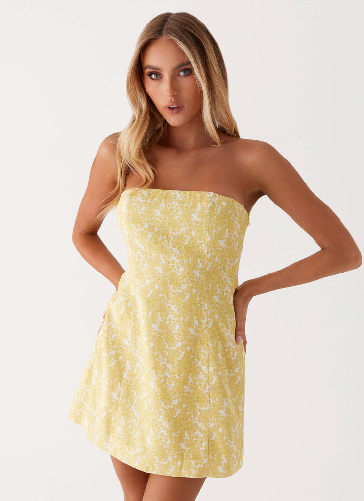 Womens Livvy Strapless Mini Dress in the colour Yellow Floral in front of a light grey background