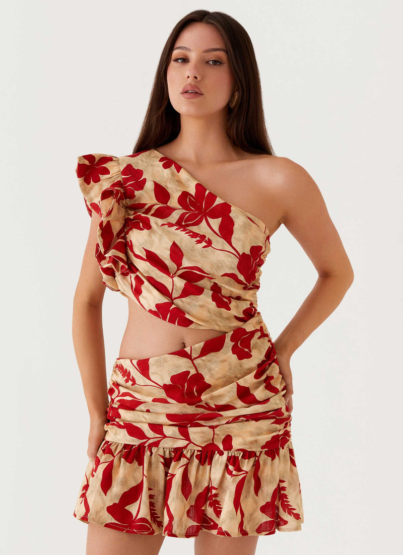 Womens Maisie Linen Mini Dress in the colour Red Green Floral in front of a light grey background