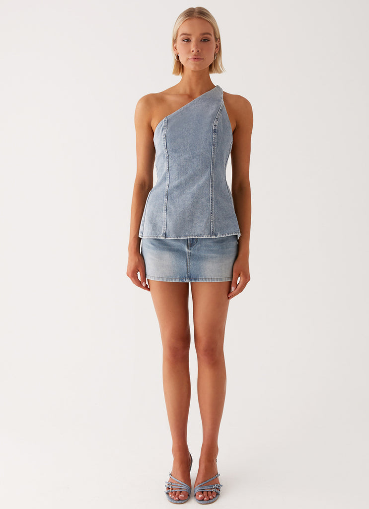 Womens Maysa Low Rise Mini Skirt in the colour Blue in front of a light grey background