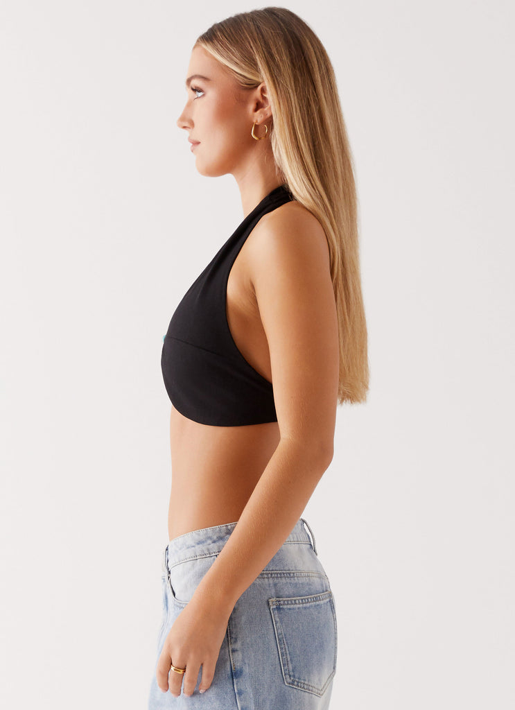 Womens Milli Halter Beaded Top in the colour Black in front of a light grey background