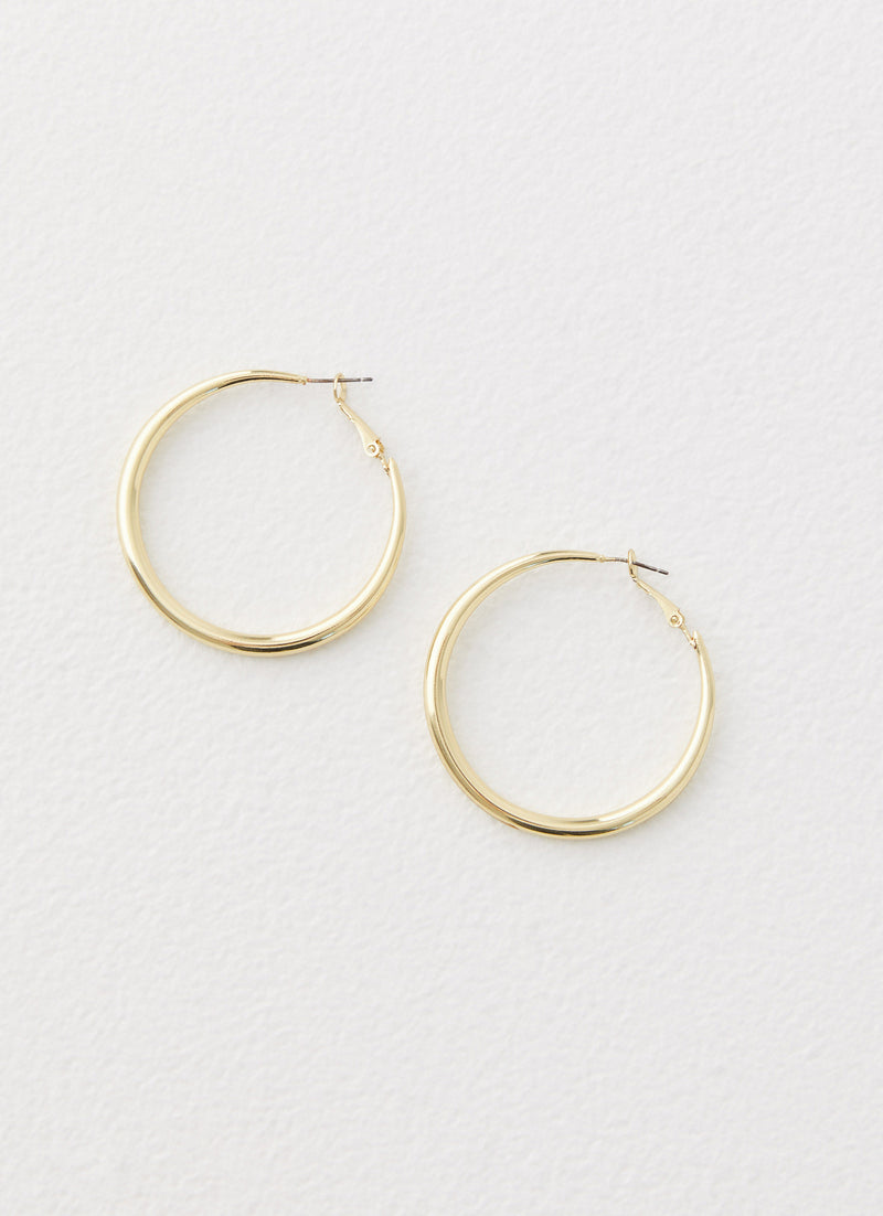 Womens Mutual Feelings Earrings in the colour Gold in front of a light grey background