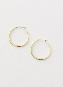 Womens Mutual Feelings Earrings in the colour Gold in front of a light grey background