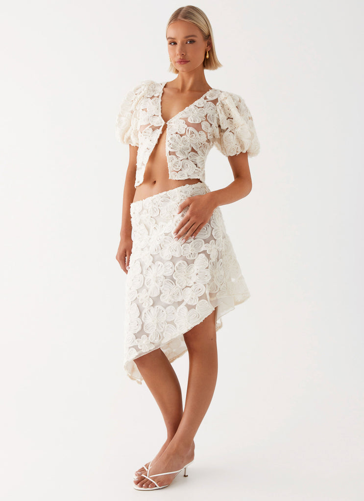 Womens Orchid Breeze Midi Skirt in the colour Ivory in front of a light grey background
