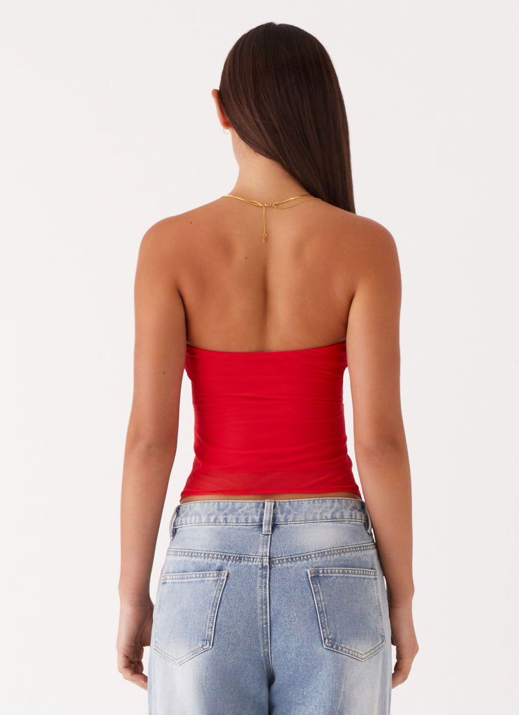 Womens Sunlight Cascade Top in the colour Red in front of a light grey background