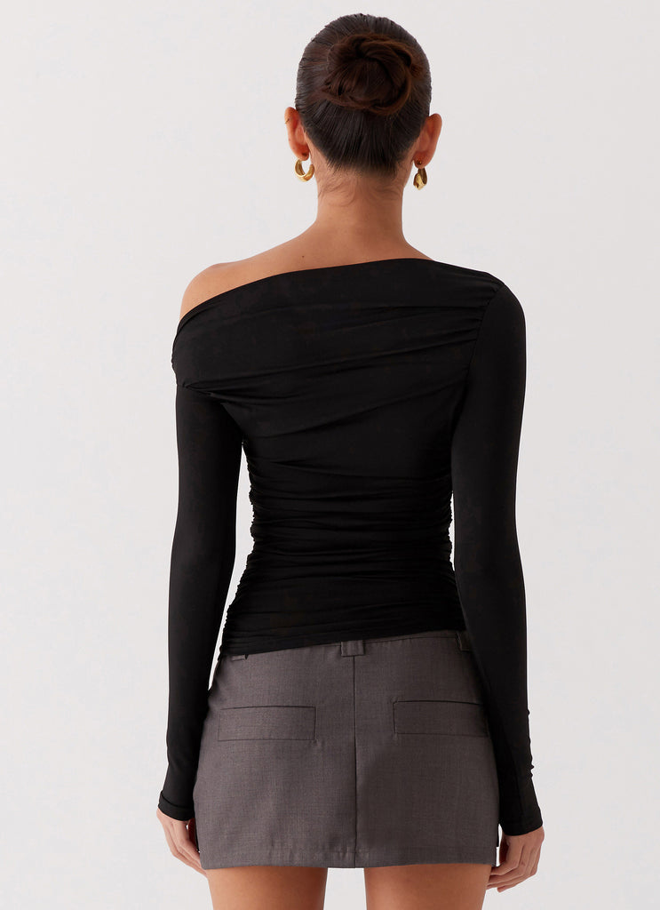 Womens Seraphina Long Sleeve Top in the colour Black in front of a light grey background