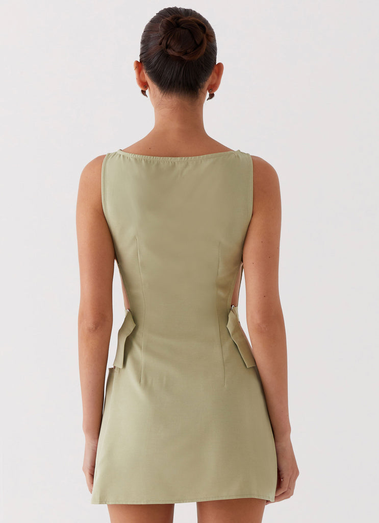 Womens Cherish You Buckle Mini Dress in the colour Olive in front of a light grey background