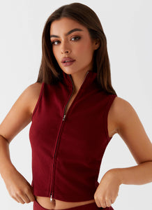 Womens Spectate Collar Top in the colour Maroon in front of a light grey background