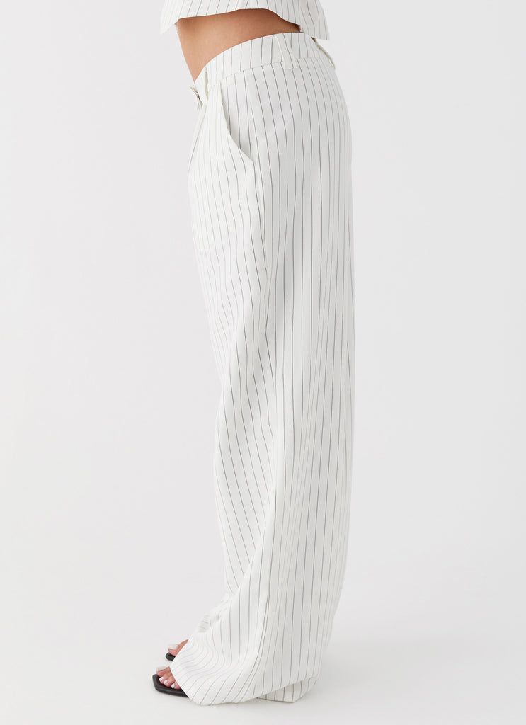 Grey and orders white striped pants