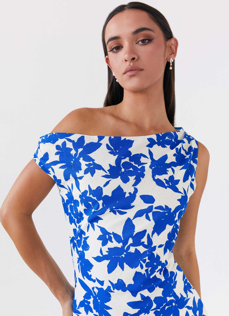 Womens Pyper Off Shoulder Maxi Dress in the colour Blue Floral in front of a light grey background