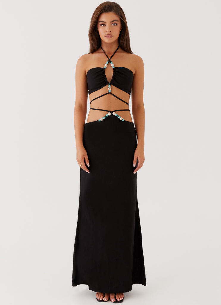 Womens Neveah Beaded Halter Top in the colour Black in front of a light grey background