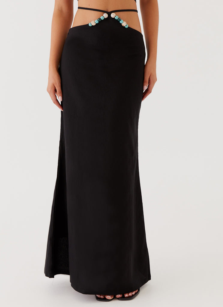 Womens Neveah Beaded Maxi Skirt in the colour Black in front of a light grey background