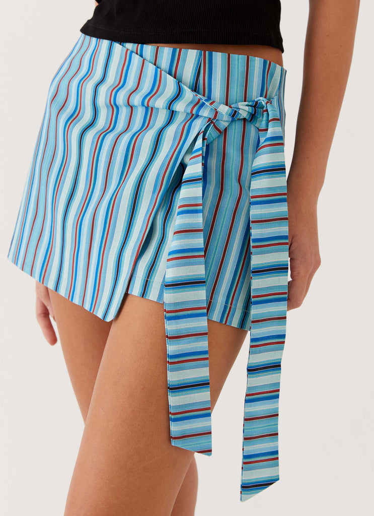 Womens Steal Away Linen Wrap Skirt in the colour Blue Stripe in front of a light grey background