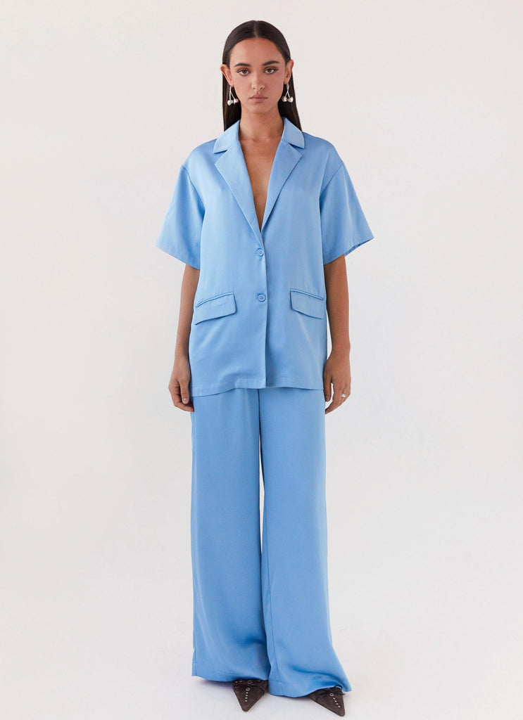 Womens Brinkley Oversized Satin Shirt in the colour Sky Blue in front of a light grey background