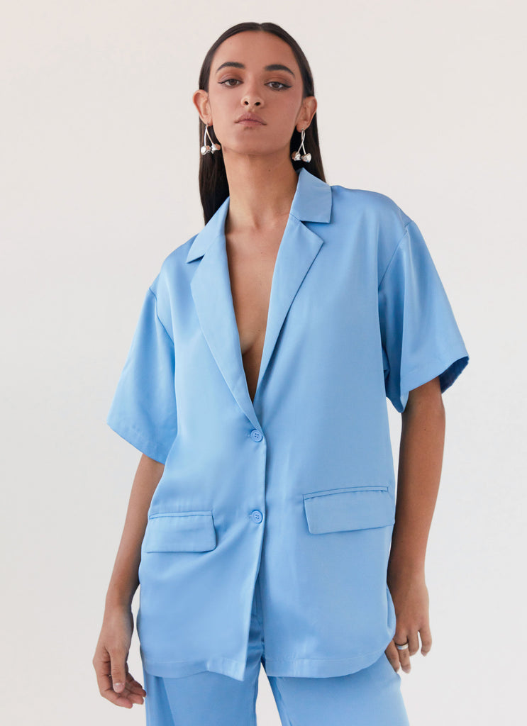 Womens Brinkley Oversized Satin Shirt in the colour Sky Blue in front of a light grey background