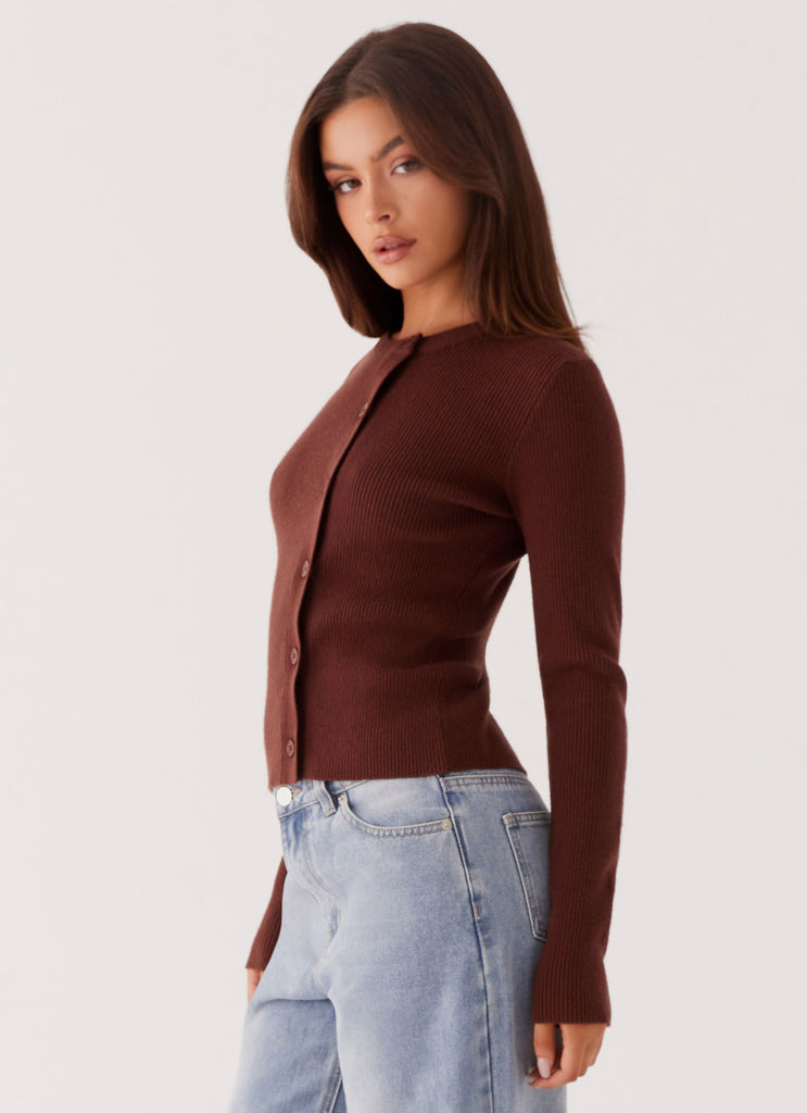 Womens Rubi Knit Long Sleeve Top in the colour Chocolate in front of a light grey background