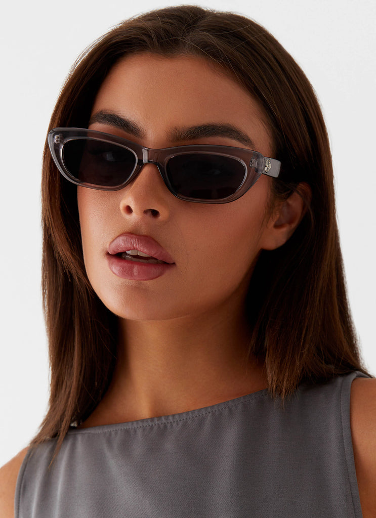 Womens Lavance Sunglasses in the colour Grey in front of a light grey background