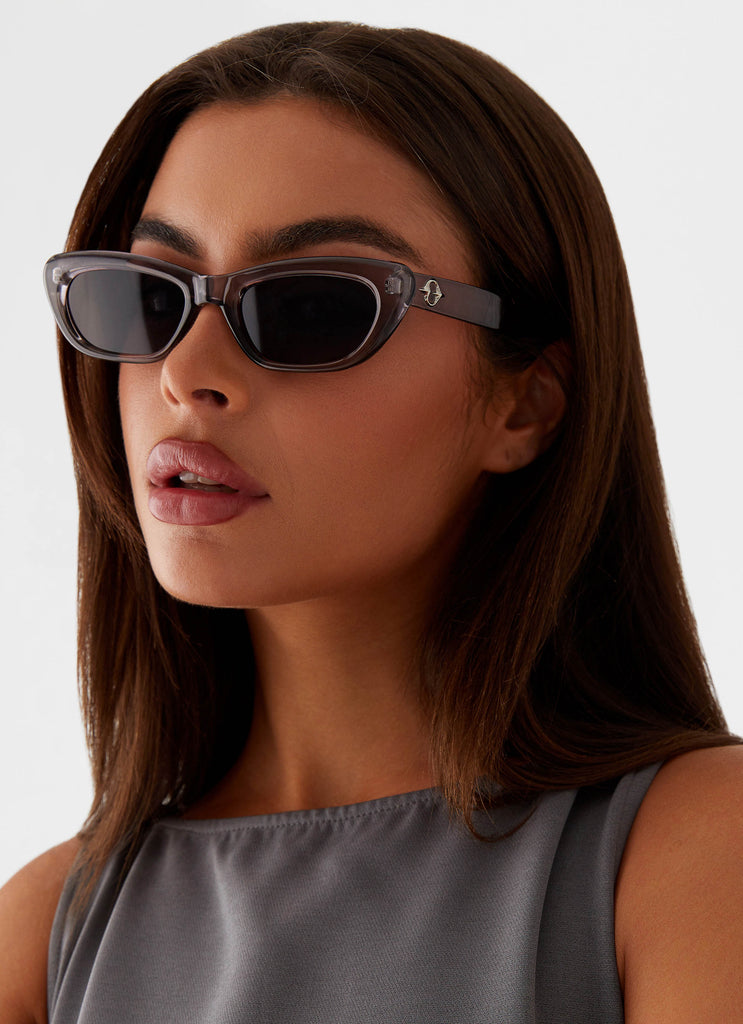 Womens Lavance Sunglasses in the colour Grey in front of a light grey background