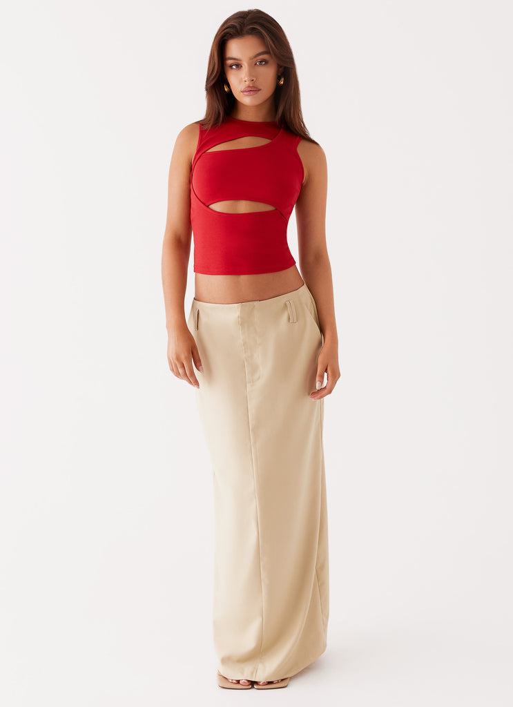 Womens Beyond Cut Out Mesh Top in the colour Red in front of a light grey background