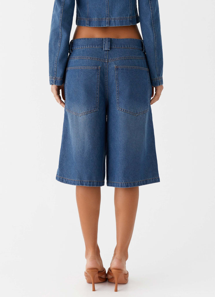 Womens Ride Elegant Baggy Jorts in the colour Vintage Blue Wash in front of a light grey background