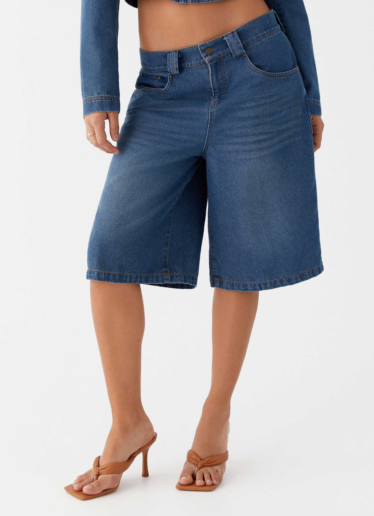 Womens Ride Elegant Baggy Jorts in the colour Vintage Blue Wash in front of a light grey background