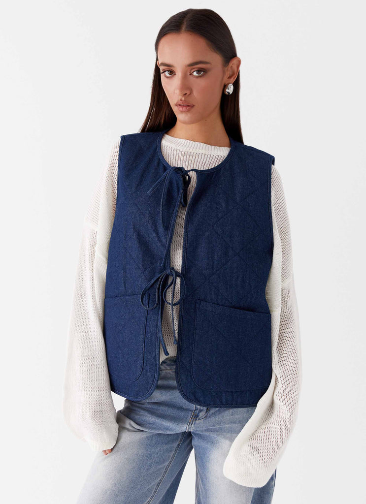 Womens Kennedy Denim Vest in the colour Indigo in front of a light grey background