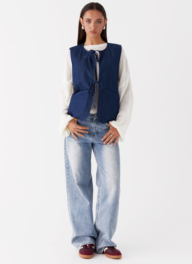 Womens Kennedy Denim Vest in the colour Indigo in front of a light grey background