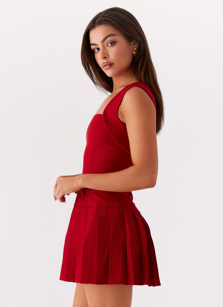 Womens Justina Belted Mini Dress in the colour Red in front of a light grey background