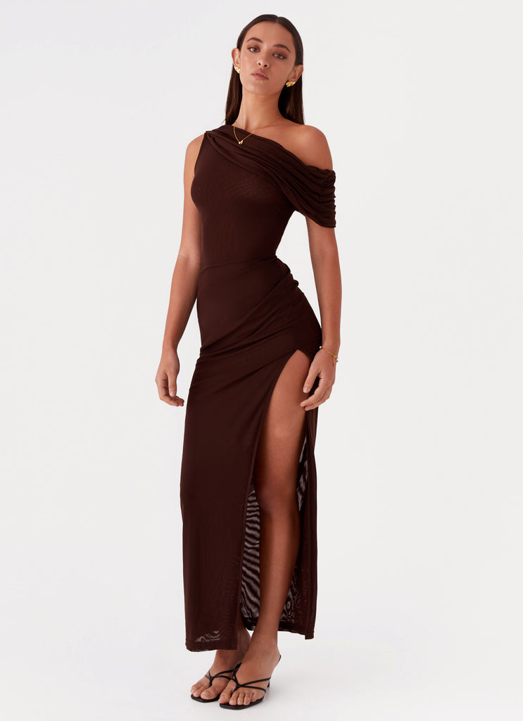 ciara brown dress She's absolutely owning the moment! @Ciara's SAG Awards ensemble is pure perfection. The brown latex dress against her radiant skin is a match made in fashion heaven. But it's the details