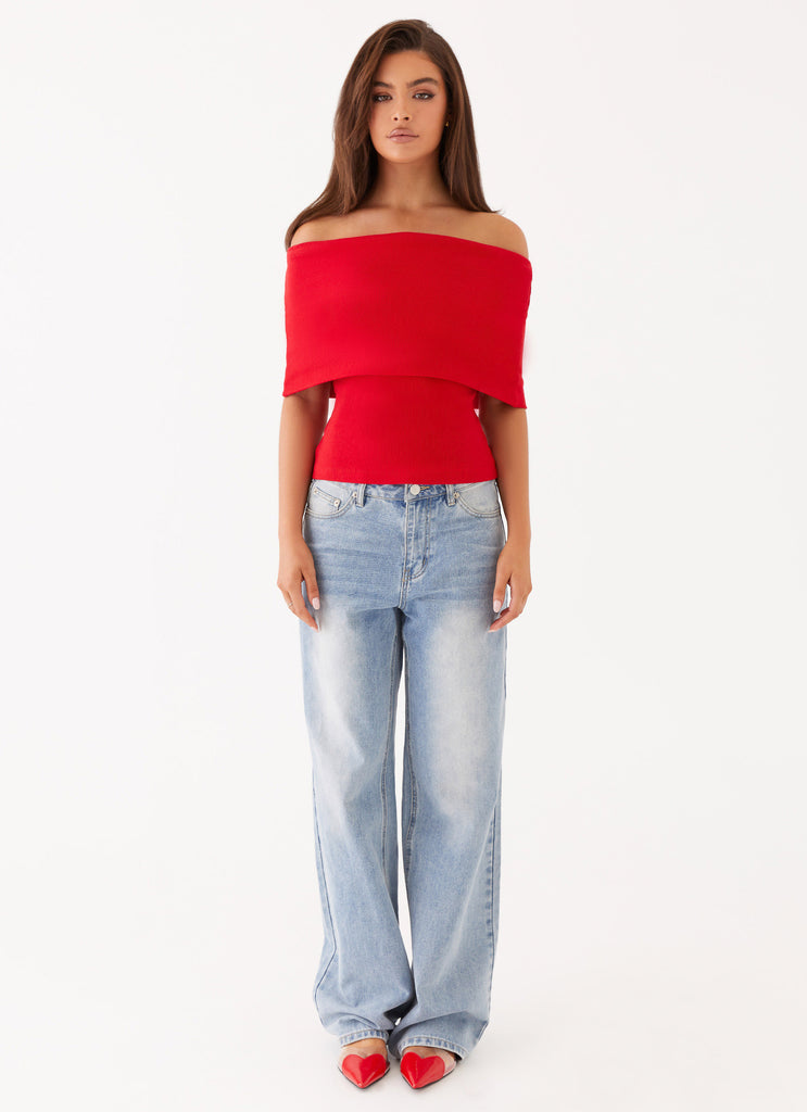 Womens Nellie Knit Top in the colour Cherry in front of a light grey background