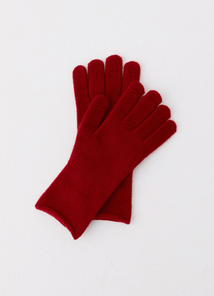 Womens Snow Angel Wool Gloves in the colour Red in front of a light grey background